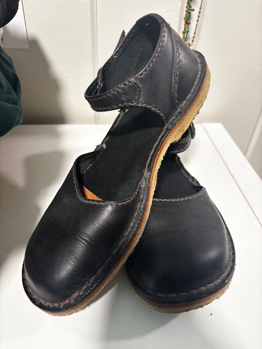 Black leather duckfeet shoe
